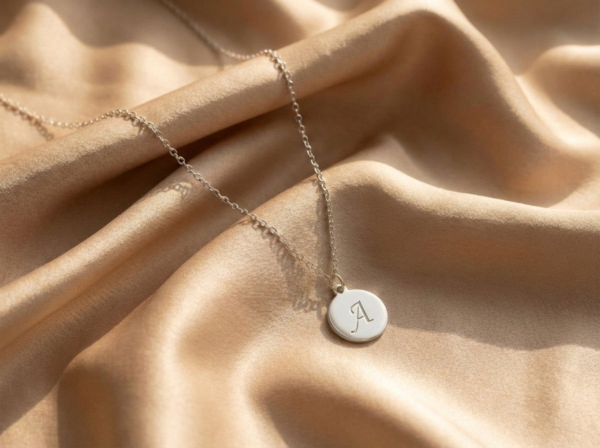 Grabado de medallón Plateado